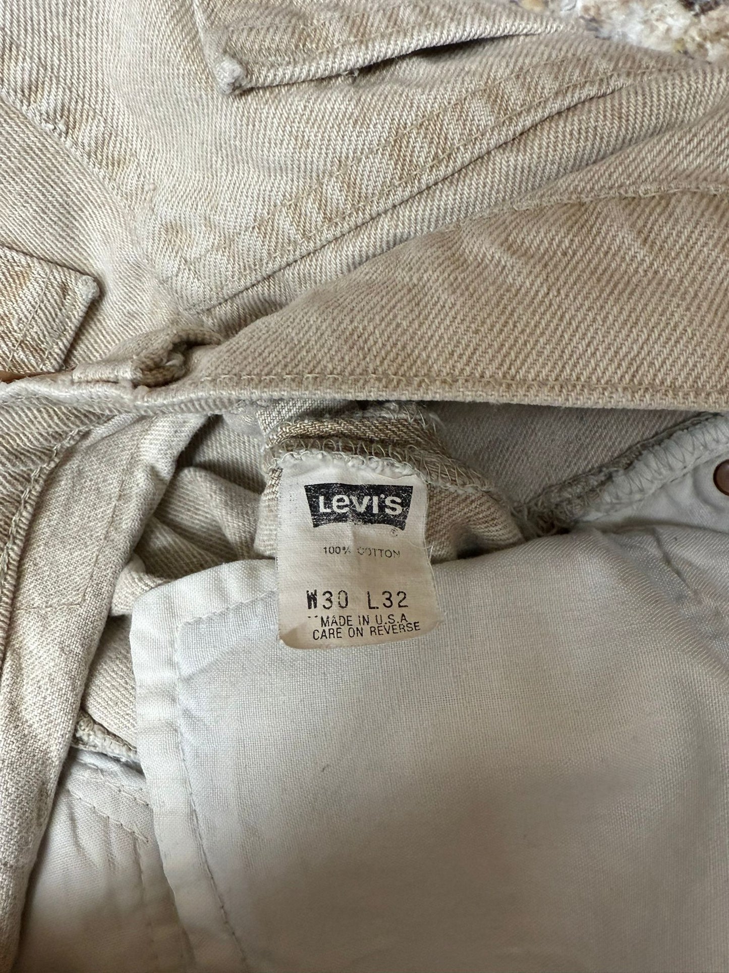 Close-up of a Levi's label on beige denim fabric